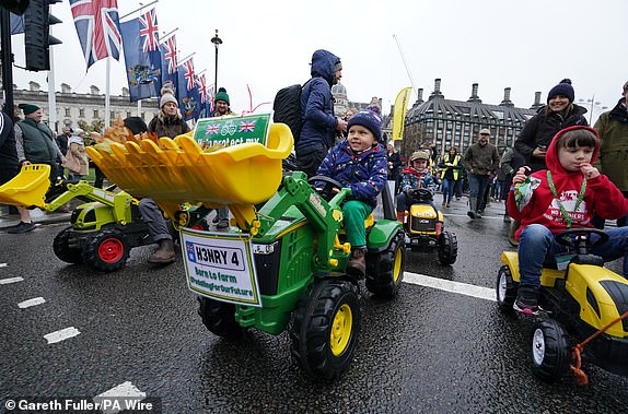 1732021303802_lc_galleryImage_Children_on_toy_tractors_.JPG