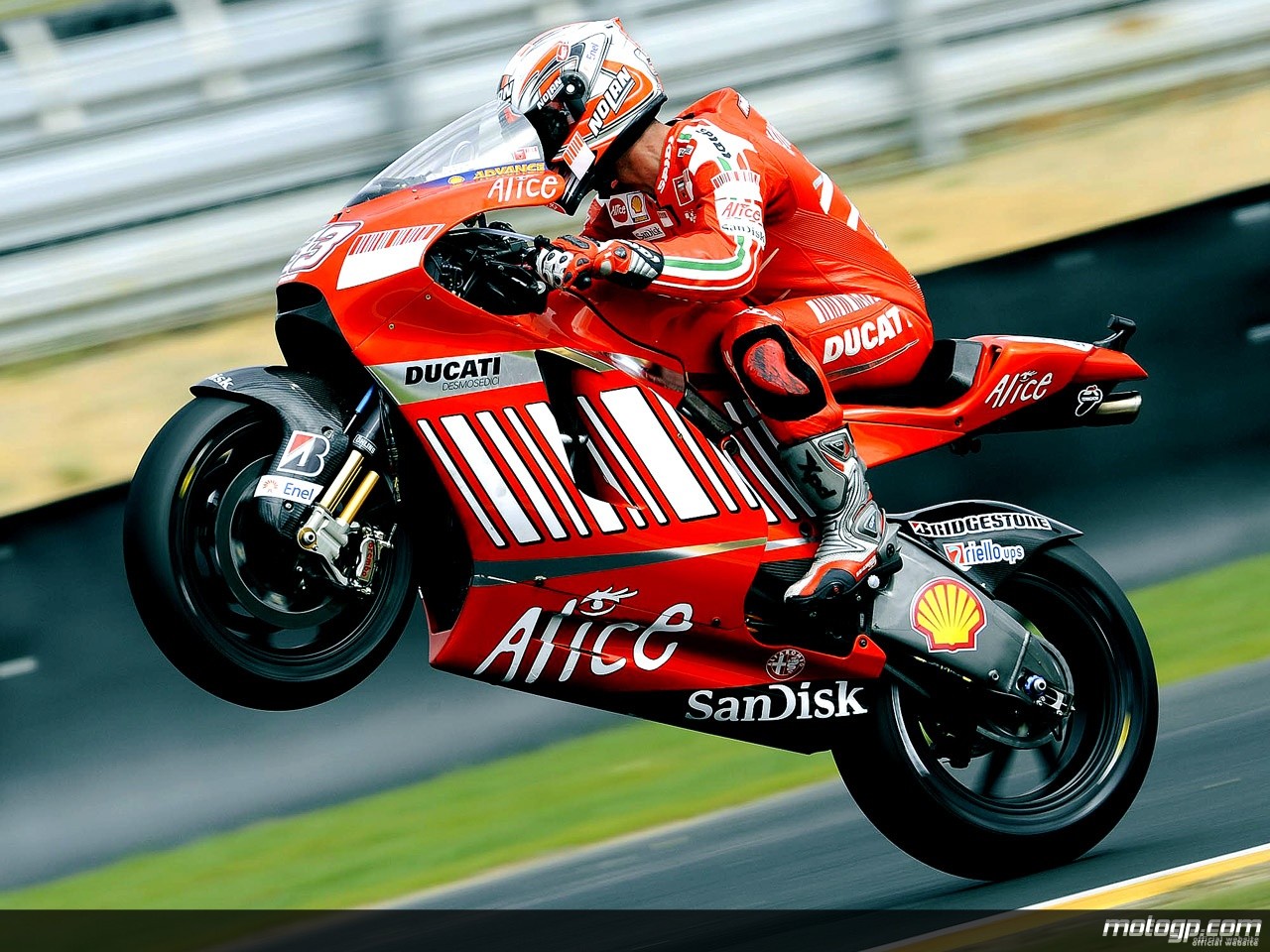 236394_marco+melandri+pulls+off+a+wheelie-1280x960-dec5.jpg._original[1].jpg