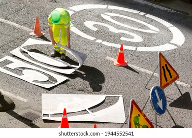 construction-workers-painting-highway-signal-260nw-1944552541.jpg