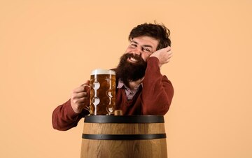 happy-bearded-man-with-wooden-barrel-beer-mug-beer-oktoberfest-craft-beer-restaurant_378307-8467.jpg