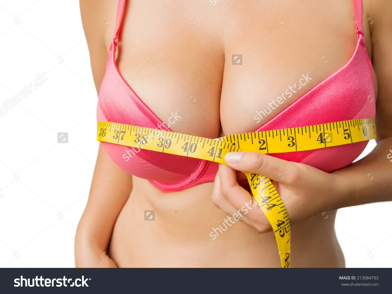 stock-photo-woman-with-big-boobs-measuring-her-bust-213084793.jpg