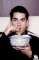 2708644-3240092_com_3192526_man_eating_popcorn_while_watching_movie.jpg