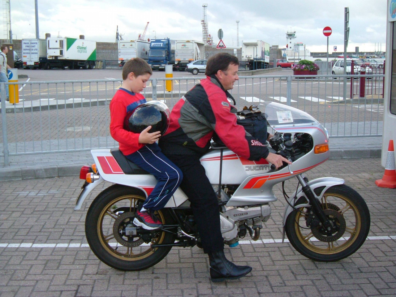 Sitting on the back of my Dad&#039;s old &#039;85 Pantah 600 before he leaves for France for a...