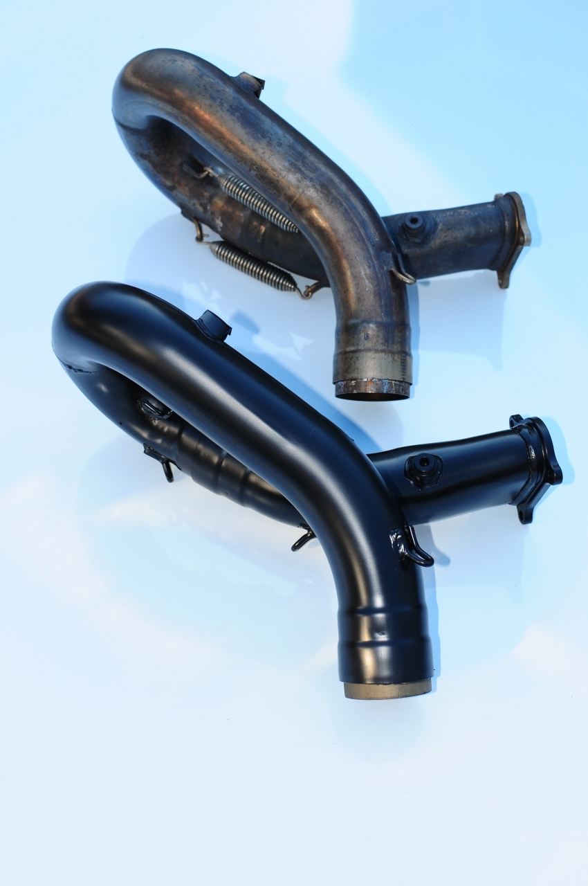 Ceramic coated rear header alongside non-coated header.