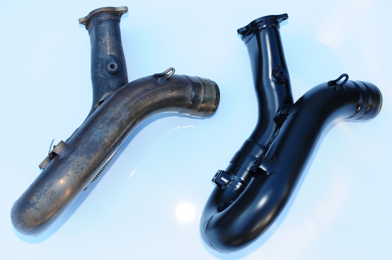 Ceramic coated rear header alongside non-coated header.